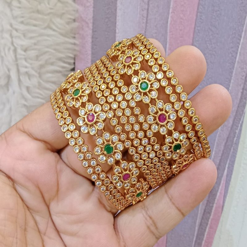 GREEN AND PINK STONE BANGLES FLOWER DESIGN