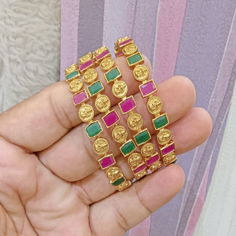 MULTI BANGLES WITH LAXMI IDOL DESIGN